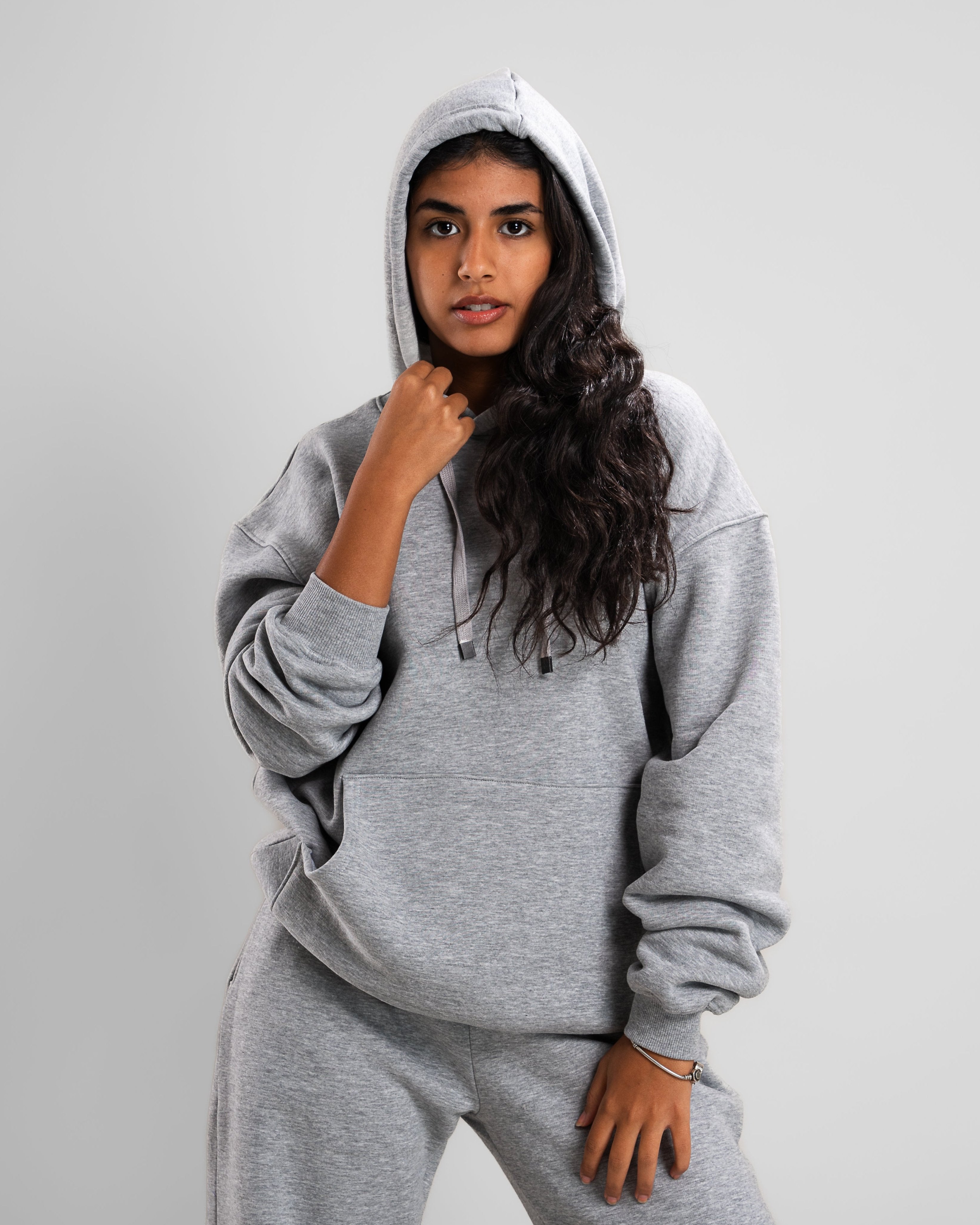 Cozy grey hoodie with front pocket, perfect for winter layering